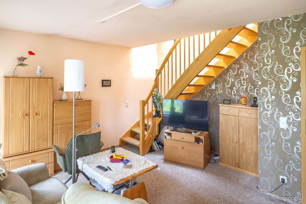 EG Wohnzimmer mit Treppe zum D