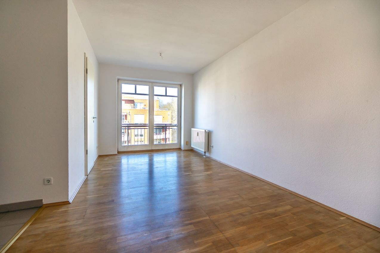 Wohnzimmer mit französischem Balkon