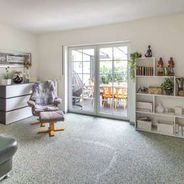 Wohnzimmer mit Zugang zum Wintergarten Ansicht 2