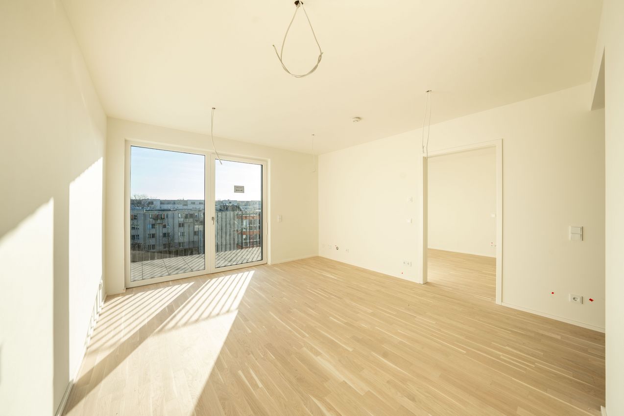 Wohn- und Küchenbereich Ansicht 2 - Zugang zum Balkon