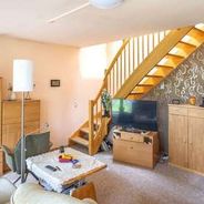 EG Wohnzimmer mit Treppe zum D