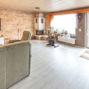 Wohnzimmer mit Ausgang zur Süd-West-Terrasse
