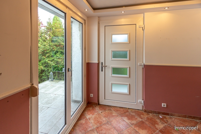 EG Eingangsveranda mit Ausgang zur Hochterrasse