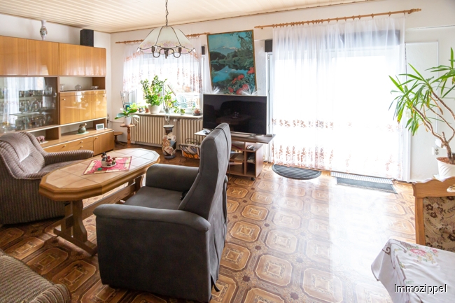 EG Wohnzimmer mit Ausgang zur Süd-Terrasse