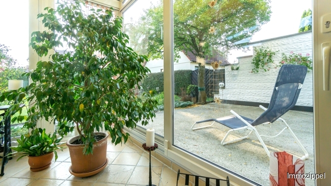 EG Wintergartenausgang zur Süd-, Westterrasse