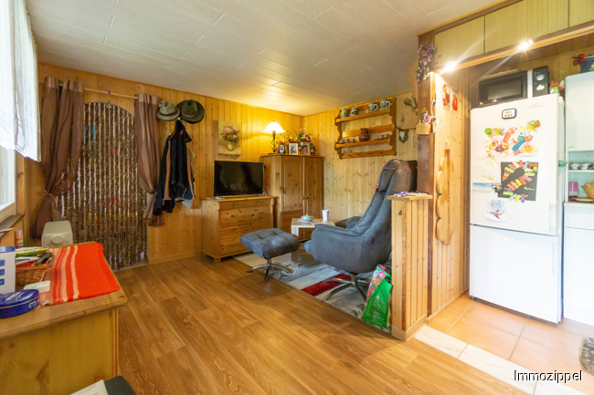 1. Freizeitbungalow - Wohnzimmer mit offener Küche